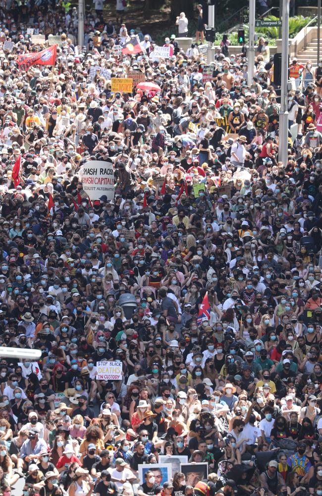 Protesters march down Elizabeth St in Sydney. Picture: John Grainger