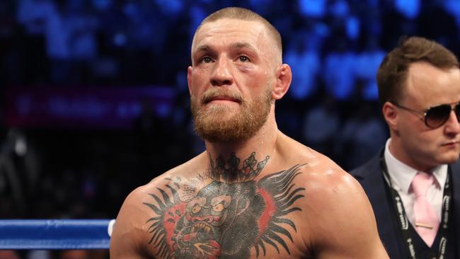 Conor McGregor has been tipped to defend his UFC titles.
