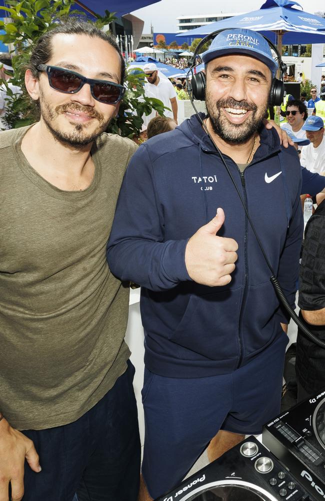 Former tennis star Marcos Baghdatis with DJ Edd Fisher. Picture: Luke Hemer