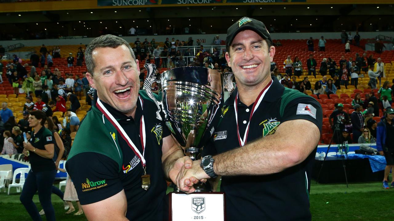 The Jets coaches Ben and Shane Walker celebrates winning the Intrust Super Cup grand final