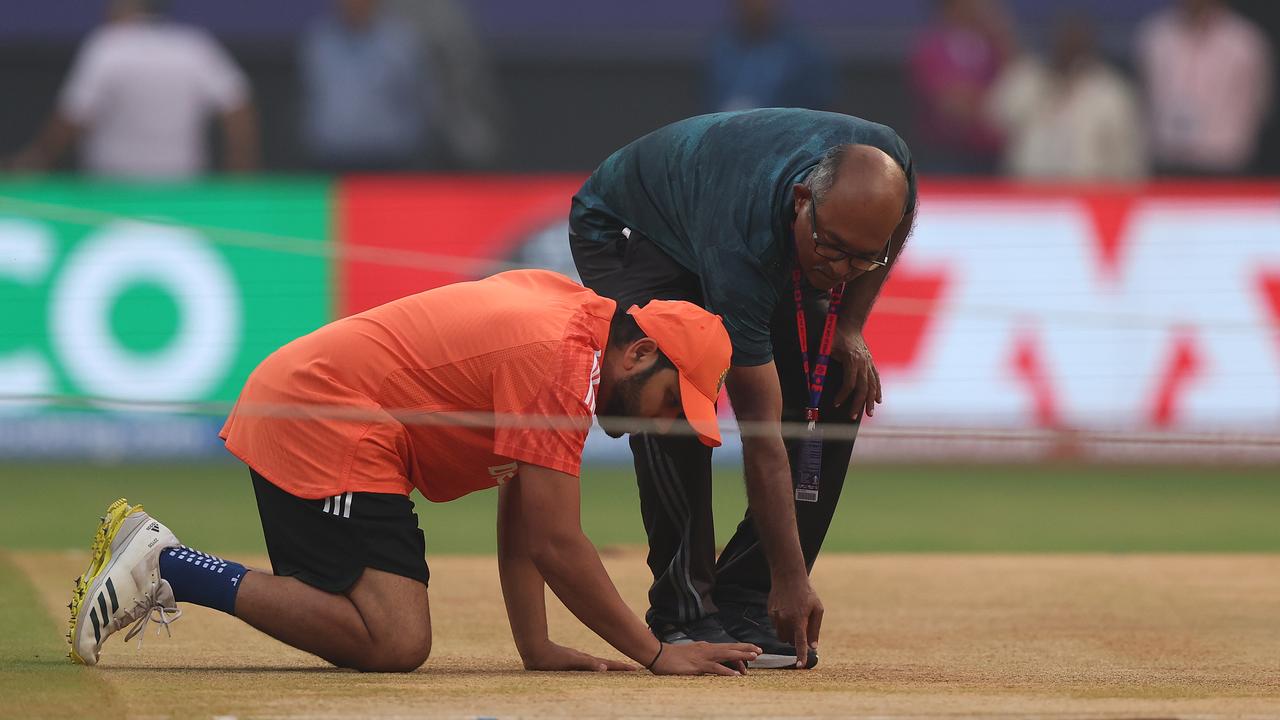Rohit Sharma of India inspects the pitch during a India training session at the ICC Men's Cricket World Cup India 2023 at Wankhede Stadium on November 14, 2023 in Mumbai, India. (Photo by Robert Cianflone/Getty Images)
