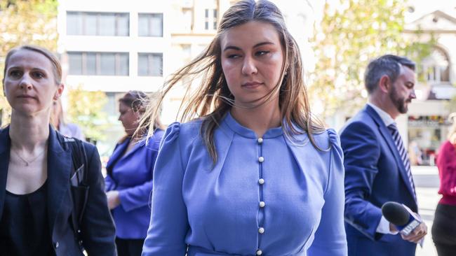 Brittany Higgins arrives at David Malcolm Justice Centre to meet face-to-face with Linda Reynolds as part of a court-ordered mediation. Picture: Colin Murty