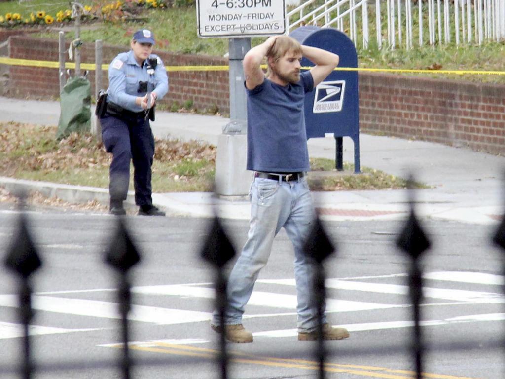 Edgar Maddison Welch surrenders to police in Washington. Welch, who said he was investigating a conspiracy theory about Hillary Clinton running a child sex ring out of a pizza place, fired an assault rifle inside the restaurant. Picture: AP