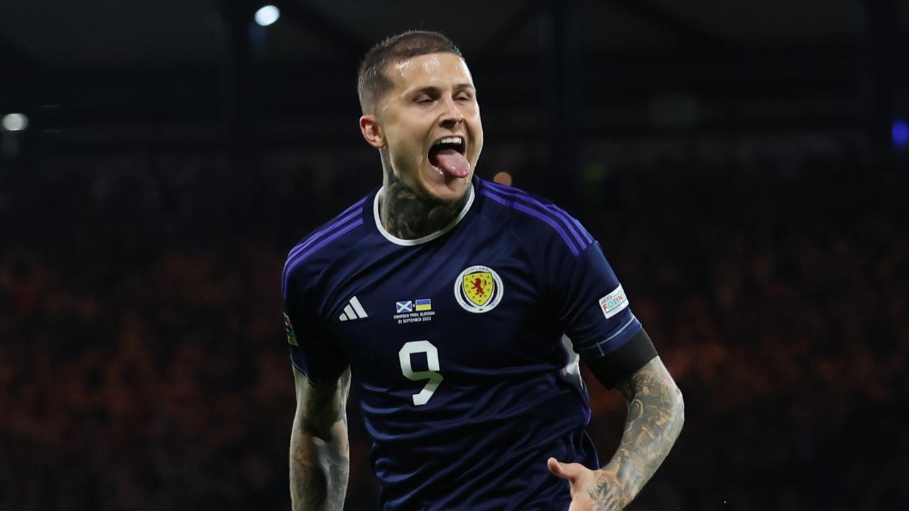 GLASGOW, SCOTLAND - SEPTEMBER 21: Lyndon Dykes of Scotland celebrates scoring his team's third goal during the UEFA Nations League League B Group 1 match between Scotland and Ukraine at Hampden Park on September 21, 2022 in Glasgow, Scotland. (Photo by Ian MacNicol/Getty Images)