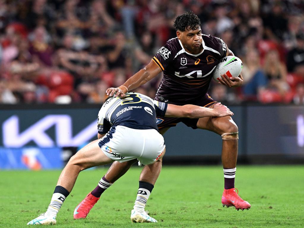 Selwyn Cobbo looks for a way past the Cowboys defence. Picture: Getty Images