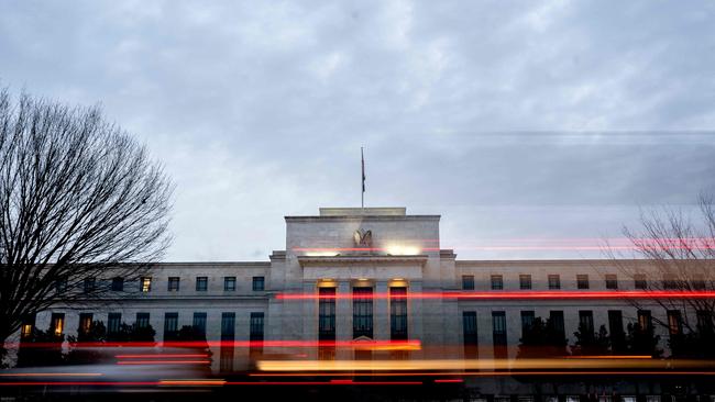 Cars drive past the Marriner S. Eccles Federal Reserve building in Washington, DC. Picture: Stefani Reynolds / AFP