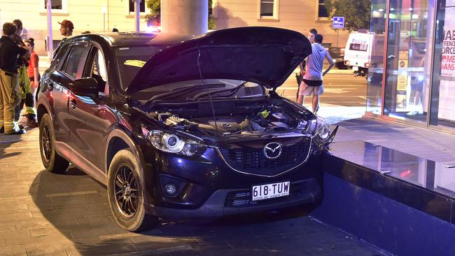 A group of juveniles armed with knives allegedly lead police on a chase across the city, stealing a car and smashing into another tonight. A Queensland Police Service spokeswoman confirmed a car was first stolen on Flinders St about 7.15pm. PICTURE: MATT TAYLOR.