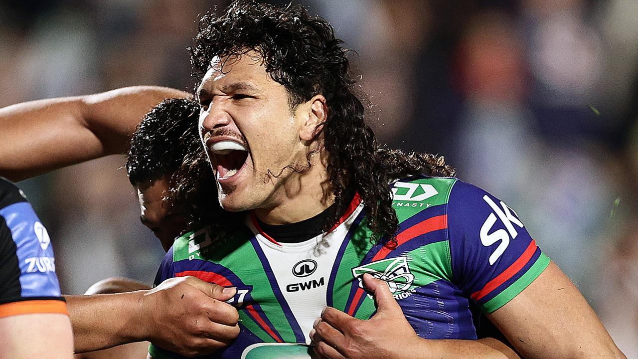 AUCKLAND, NEW ZEALAND - JULY 26: Dallin Watene-Zelezniak of the Warriors celebrates scoring a try during the round 21 NRL match between New Zealand Warriors and Wests Tigers at Go Media Stadium Mt Smart, on July 26, 2024, in Auckland, New Zealand. (Photo by Dave Rowland/Getty Images)