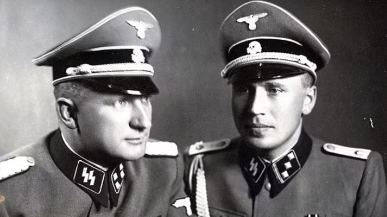 The very first photograph in the album is a double portrait of Richard Baer (left) and Karl Höcker (right) Picture: US Holocaust Memorial Museum