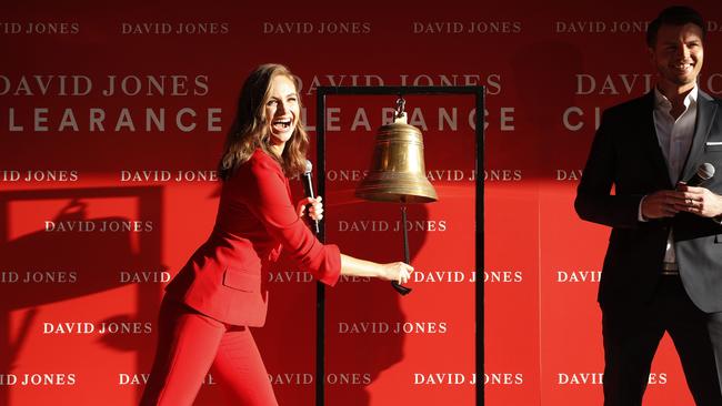 Ksenija Lukich rings the bell with Shawn Dooley outside of the David Jones Elizabeth St store during the Boxing Day sales on December 26, 2018 in Sydney, Australia. Picture: Getty