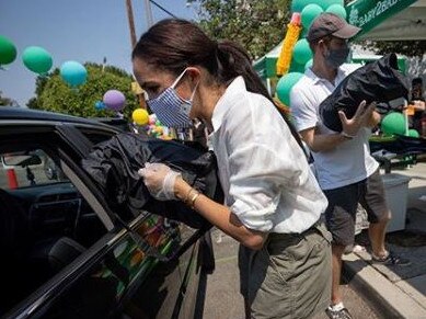 Meghan Markle and Prince Harry volunteer at a school charity drive in Los Angeles. Picture: Instagram