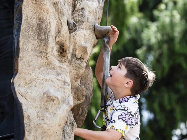 Brooklyn Metcalfe on the climbing wall at Fairholme Spring Fair, Saturday, October 19, 2024. Picture: Kevin Farmer