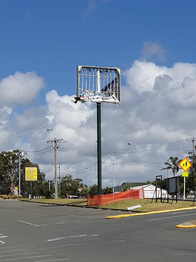 The derelict sign at Ashmore Plaza locals are calling an 'eyesore'. 