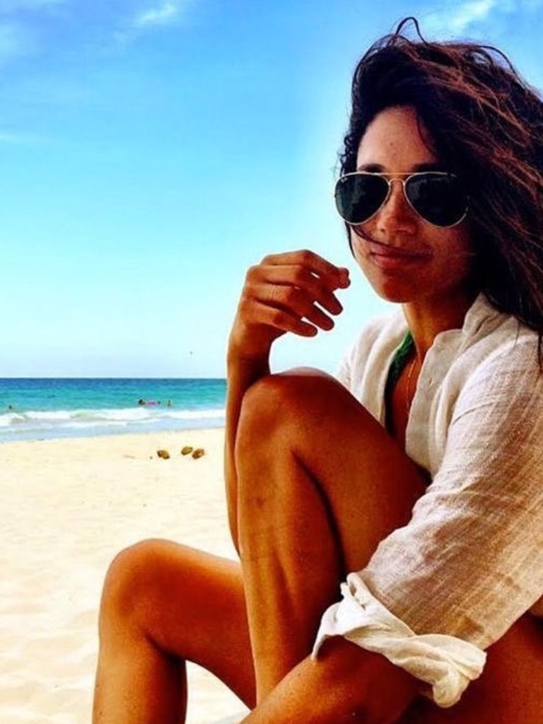 Bronzed beach babe.