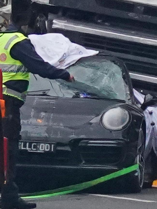 Pusey’s Porsche crushed by the truck at the Eastern Freeway crash scene. Picture: AAP