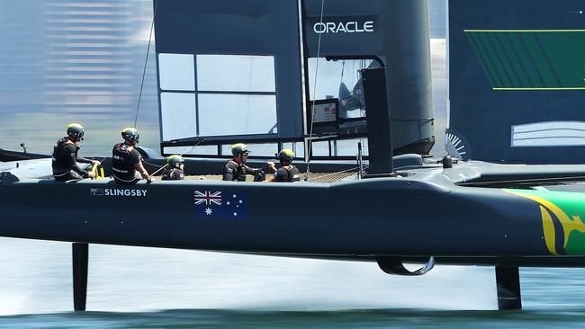 The Australia SailGP team foiling during a training session race on Sydney Harbour.