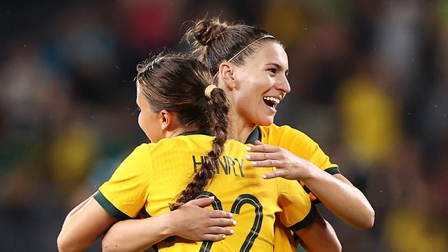 Bryleeh Henry and Steph Catley after her debut.