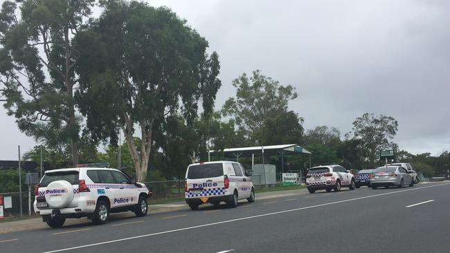 Police vehicles outside Helensvale State School this morning.