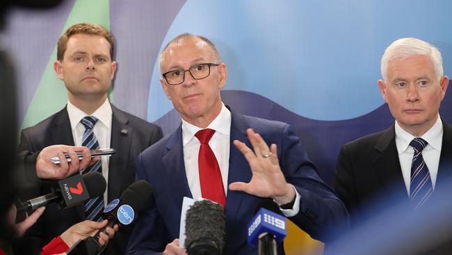 Minister Steven Mulligan, Premier Jay Weatherill and Deputy Premier John Rau speak to the media about the collapsed deal. Picture: Dylan Coker