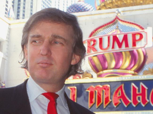 ATLANTIC CITY, NJ - APRIL 1990:  Businessman Donald Trump stands in front of Taj Mahal Casino Hotel in April 1990 in Atlantic City, New Jersey.  (Photo by Jeffrey Asher/ Getty Images)