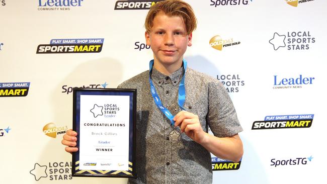 Brock Gillies receives his award for winning the Sunbury/Macedon Ranges Leader Junior Sporting Spirit title.