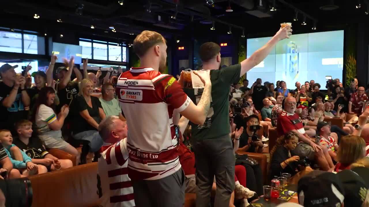 Wigan Warriors supporters erupt into song at the NRL's Las Vegas fan hub