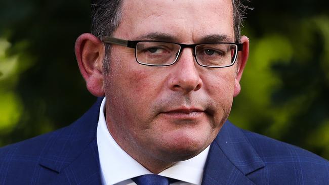 MELBOURNE, AUSTRALIA - FEBRUARY 04: Premier of Victoria Daniel Andrews speaks and makes a gesture during a Press conference at Victorian Parliament House on February 04, 2021 in Melbourne, Australia. Victoria has reintroduced COVID-19 restrictions after a hotel quarantine worker tested positive for coronavirus on Wednesday. The positive case was from one of the Australian Open quarantine hotels, with some 600 Australian Open players, officials and support staff told to isolate and get tested. All tennis matches at Melbourne Park on Thursday have been called off. Masks are now mandatory indoors across Victoria with gatherings now limited to 15 people in a household while the 75 percent return to work plan, scheduled to begin on Monda has been paused. (Photo by Asanka Ratnayake/Getty Images) *** BESTPIX ***