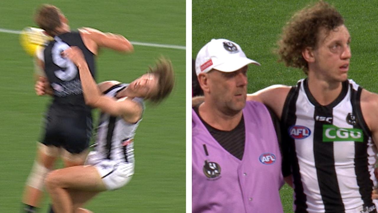 Collingwood's Chris Mayne was left worse for wear when he collided with Carlton's Patrick Cripps.