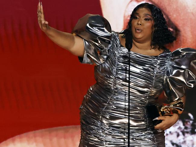 LOS ANGELES, CALIFORNIA - FEBRUARY 05: Lizzo accepts the Record Of The Year award for Ã¢â¬ÅAbout Damn TimeÃ¢â¬Â onstage during the 65th GRAMMY Awards at Crypto.com Arena on February 05, 2023 in Los Angeles, California. (Photo by Kevin Winter/Getty Images for The Recording Academy)