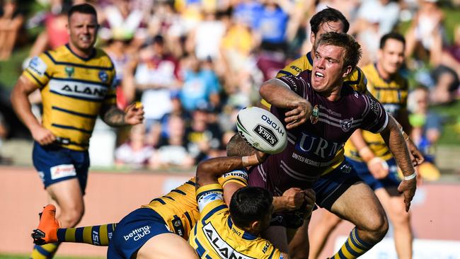 Jake Trbojevic (right) for the sea eagles off-loads a pass to Lachlan Croker to score during the Round 2 NRL match between the Manly-Warringa Sea Eagles and the Parramatta Eels at Lottoland in Sydney, Sunday, March 18, 2018. (AAP Image/Brendan Esposito) NO ARCHIVING, EDITORIAL USE ONLY