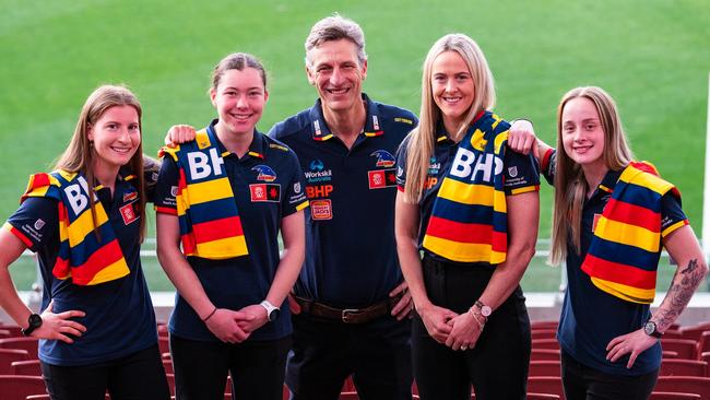 Crows AFLW players Sarah Goodwin, Brooke Smith, Yvonne Bonner and Taylah Levy with coach Matthew Clarke. Picture: Supplied