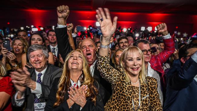 Supporters of Republican Ron DeSantis cheer during an election night party at the Convention Centre in Tampa, Florida.