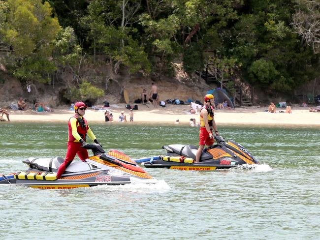 Holiday makers Pictured enjoying the Tallebudgera Crk while Life Guards watch over them.   Picture Mike Batterham