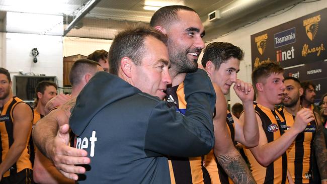 Alastair Clarkson enjoys a victory with Hawks veteran Shaun Burgoyne.