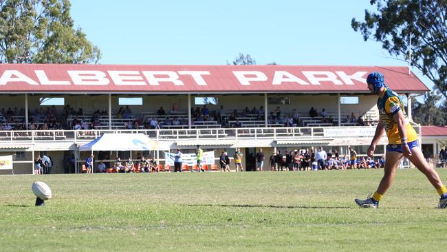 Gympie's Tim Wyvill runs up for a conversion attempt in front of Albert Park grandstand. Gympie Devils V Pomona-Cooran Cutters, Albert Park, Gympie. August 5, 2017