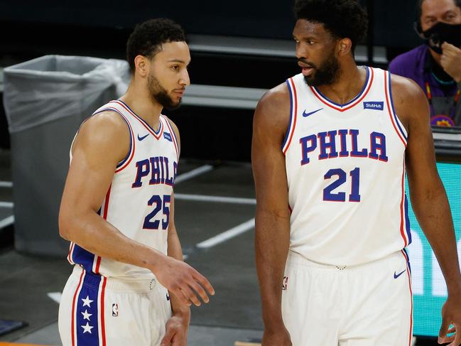 (FILES) In this file photo taken on February 12, 2021 Ben Simmons #25 and Joel Embiid #21 of the Philadelphia 76ers talk during the NBA game at Phoenix Suns Arena on February 13, 2021 in Phoenix, Arizona. - Philadelphia 76ers star Joel Embiid on September 1, 2021 denied reports of a rift with team-mate Ben Simmons amid reports that the Australian star is seeking to leave the franchise. (Photo by Christian Petersen / GETTY IMAGES NORTH AMERICA / AFP)