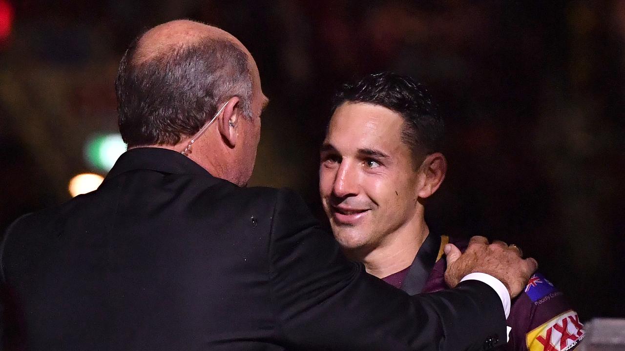 Billy Slater (right) of the Maroons is presented with the player-of-the-series medal by Wally Lewis (left). Picture: AAP