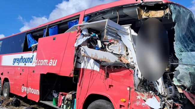 Photographs taken in the immediate aftermath of a horror fatal Greyhound passenger bus crash at Gumlu on the Bruce Highway south of Ayr on Sunday. The bus driver, picture, miraculously survived. The bus carrying 33 passengers was travelling north when it collided head on with a caravan being towed by a four-wheel drive driven by an elderly couple. Three passengers on the bus were killed while two others remained in critical conditions in Townsville University Hospital on Monday morning. Picture: Supplied