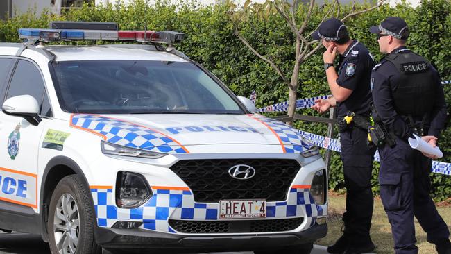 Police on the ground in Pimpama where former bikie Shane Bowden was gunned down. Picture: Glenn Hampson