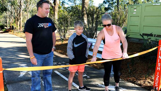 Darren, Cody and Simon Tickell open Blake Tickell's memorial bench and garden at Bernie Mullane sports complex, Kellyville. Picture: Angelo Velardo