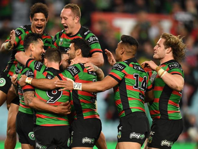 The Rabbitohs celebrate John Sutton's try during the Round 25 NRL match between the South Sydney Rabbitohs and the Wests Tigers at ANZ Stadium in Thursday, August 30, 2018. (AAP Image/Dean Lewins) NO ARCHIVING, EDITORIAL USE ONLY