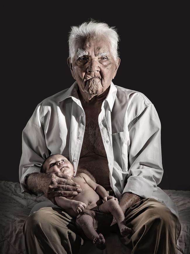 '100 years and 3 Weeks'- Alf 'Popeye' Neal OAM with his great great grandson Kailan in his Yarrabah home after reaching 100 years of age. Picture: Brian Cassey