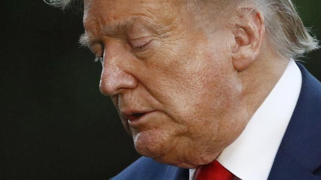 President Donald Trump walks across the South Lawn of the White House in Washington, Saturday, May 30, 2020, after stepping off Marine One as he returns from Kennedy Space Center for the SpaceX Falcon 9 launch. (AP Photo/Patrick Semansky)