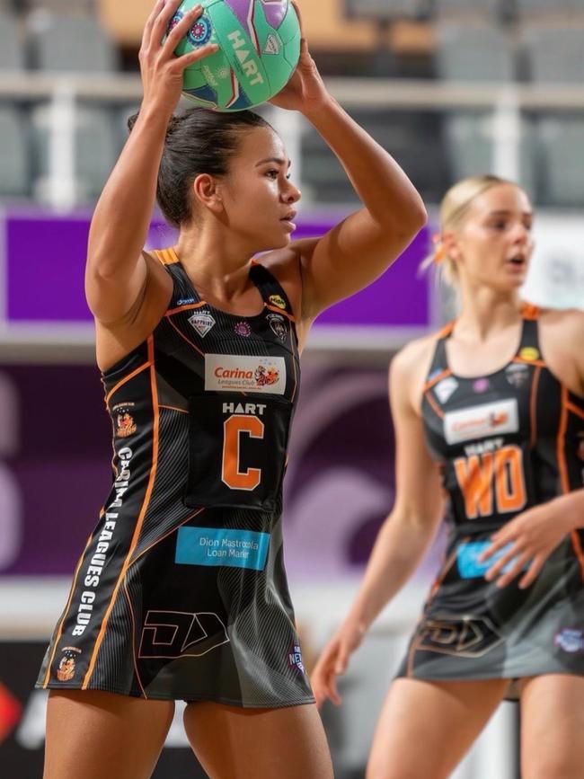 Jessie Laga'aia playing for Carina Tigers Netball Club