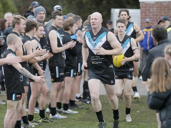 Barry Hall runs out for Cygnet to start the match. Picture: PATRICK GEE