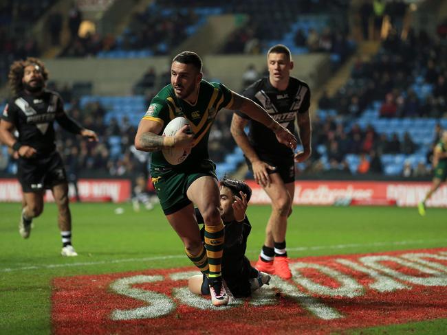 Shaun Johnson of New Zealand and Darius Boyd of Australia