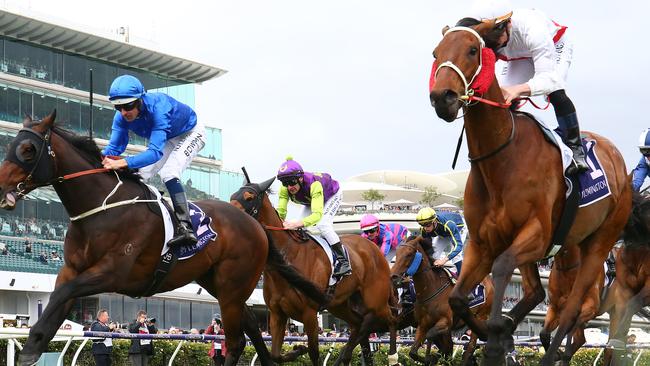 MELBOURNE, AUSTRALIA - NOVEMBER 09: James McDonald rides #1 Mandela Effect to win race one the Cup Week Radio Trophy during 2019 Stakes Day at Flemington Racecourse on November 09, 2019 in Melbourne, Australia. (Photo by Robert Cianflone/Getty Images)