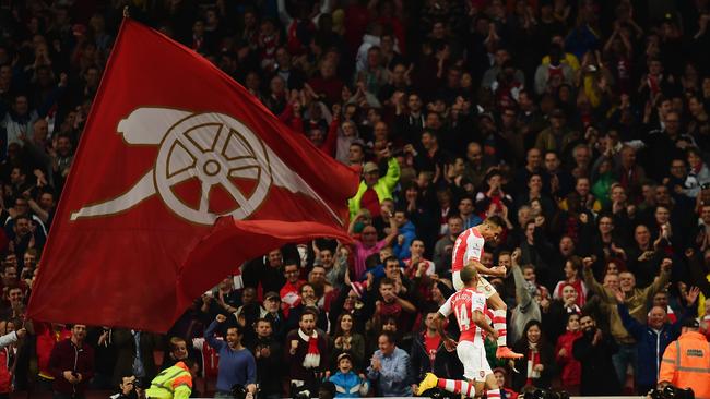 Alexis Sanchez of Arsenal celebrates scoring in front of the faithful.