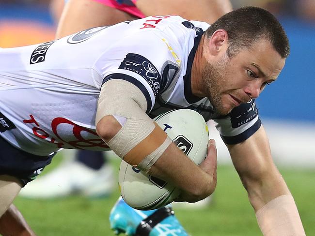 GOLD COAST, AUSTRALIA - SEPTEMBER 01:  Shaun Fensom of the Cowboys scores a try during the round 25 NRL match between the Gold Coast Titans and the North Queensland Cowboys at Cbus Super Stadium on September 1, 2018 in Gold Coast, Australia.  (Photo by Chris Hyde/Getty Images)