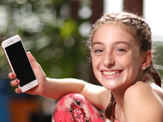 MoneysaverHQ.Data Consumption Among Kids.Mum Anya Hart, 41 and her daughter Charlotte, 12, has a mobile phone but the children don't overuse the mobiles and are on their father Tim's plan which shares data and calls and texts. Picture: NIGEL HALLETT